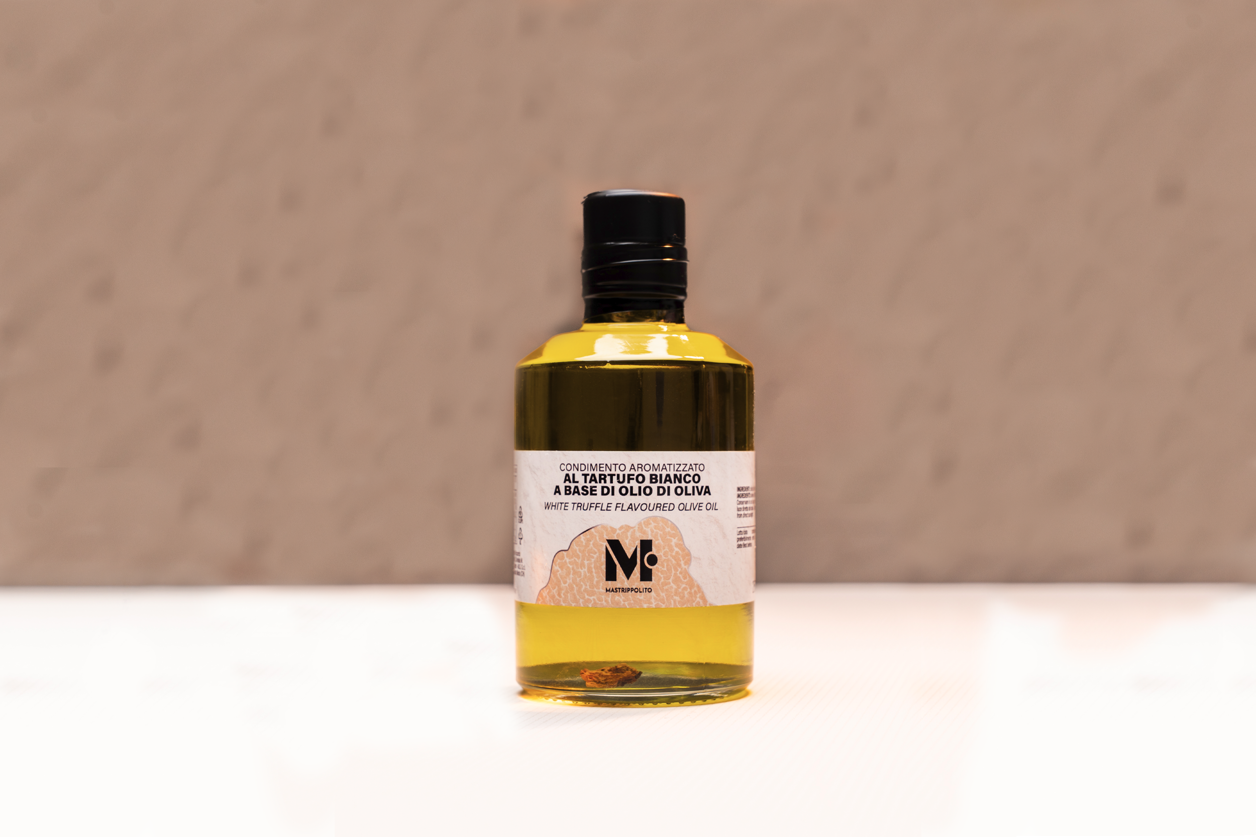 Condimento aromatizzato al tartufo bianco a base di olio d'oliva